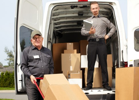 Professional movers handling household items during a Chiswick relocation