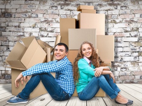 Furniture being carefully loaded into a moving truck