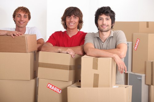 Office removals planning in Chiswick with moving boxes and desks