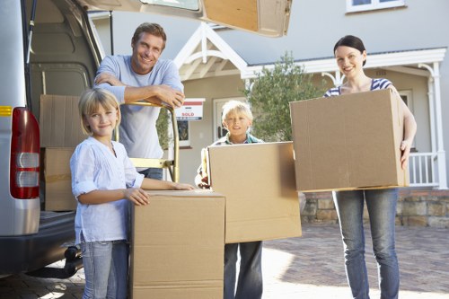 Furniture and boxes being loaded for a Chiswick move