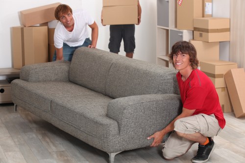 Furniture and IT items being prepared for an office move in Chiswick