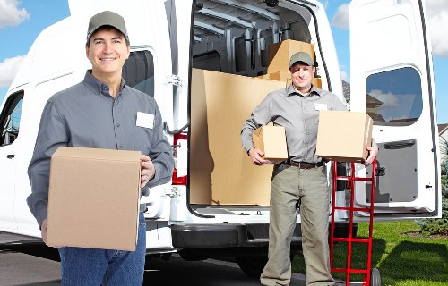 Packed boxes and furniture ready for transport during a Chiswick home move
