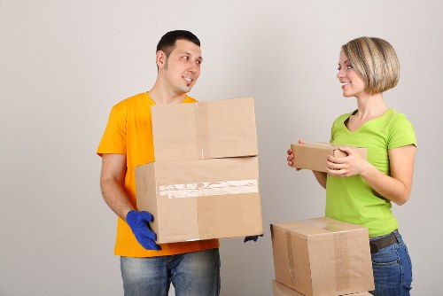 Office relocation setup with desks and equipment prepared for transport